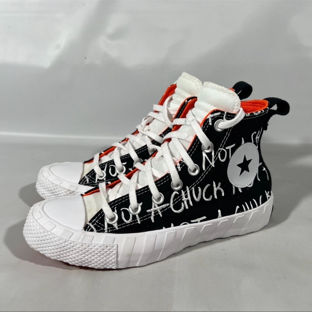 Converse Kids Black and White Sneakers with Orange Highlights